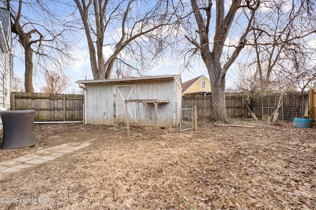 view of shed with a fenced backyard