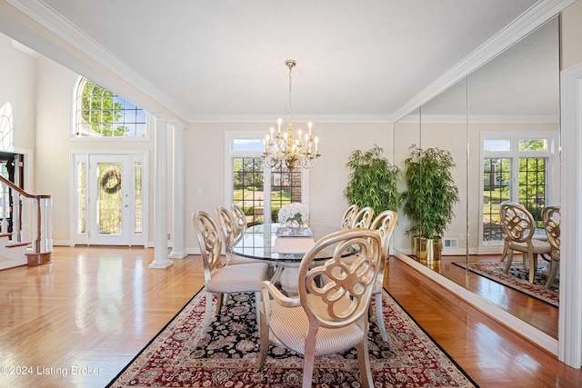 dining space with ornate columns and plenty of natural light