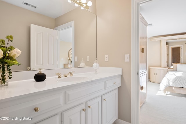 bathroom featuring vanity and visible vents