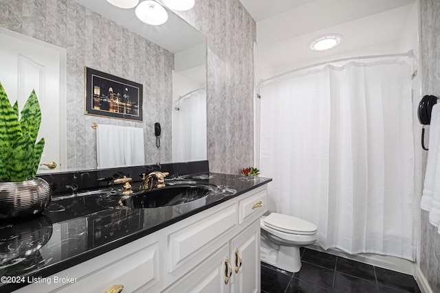 bathroom featuring wallpapered walls, vanity, and tile patterned floors