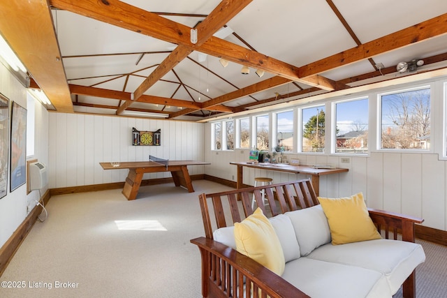 rec room with vaulted ceiling with beams, carpet, and baseboards