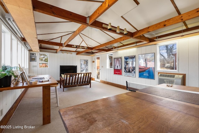 unfurnished sunroom with vaulted ceiling with beams and an AC wall unit