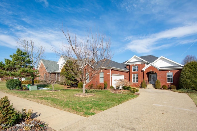 view of front facade with an attached garage, driveway, brick siding, and a front yard