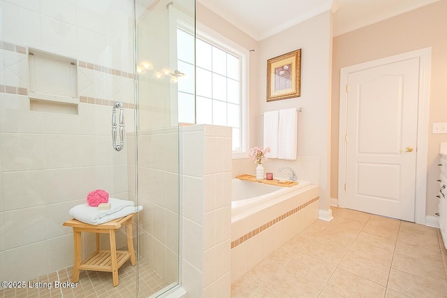 bathroom featuring tiled shower, a bath, and tile patterned floors