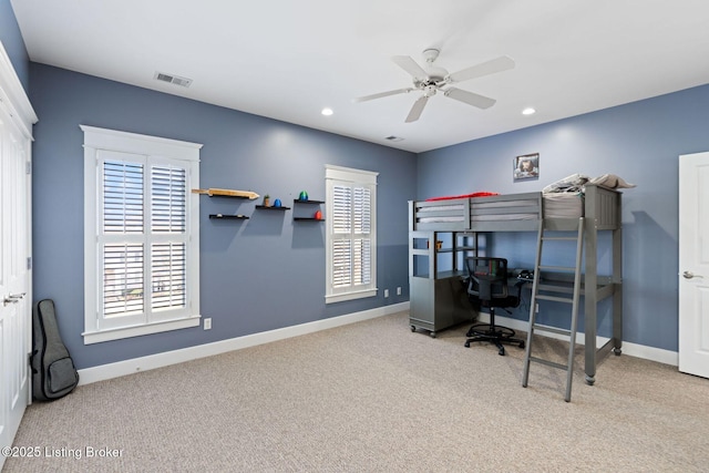 bedroom with carpet floors, recessed lighting, visible vents, and baseboards