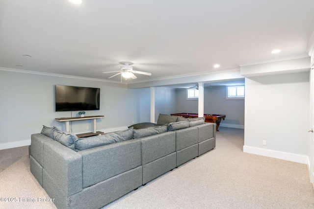 living room with crown molding, carpet, and baseboards