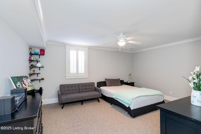 bedroom featuring light carpet, ornamental molding, a ceiling fan, and baseboards