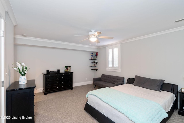 bedroom featuring ceiling fan, carpet flooring, visible vents, baseboards, and crown molding