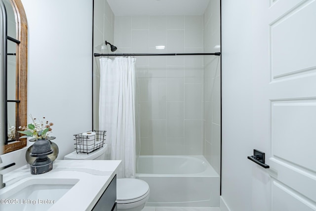 full bathroom featuring toilet, shower / tub combo, and vanity