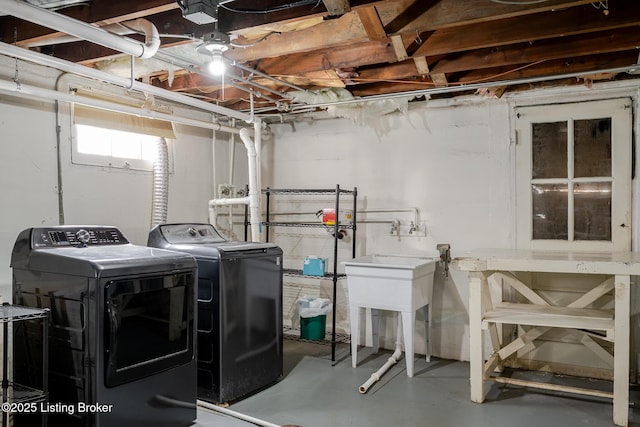 washroom with washer and dryer and laundry area