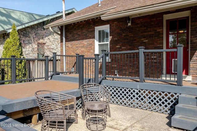 view of patio / terrace featuring a wooden deck