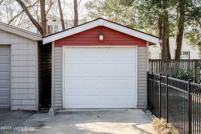 garage featuring fence