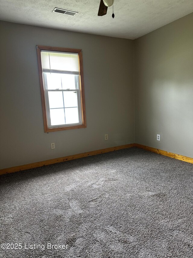1683 Anneta Rd, Leitchfield, KY 42754 - carpeted empty room with baseboards, a ceiling fan, and a textured ceiling