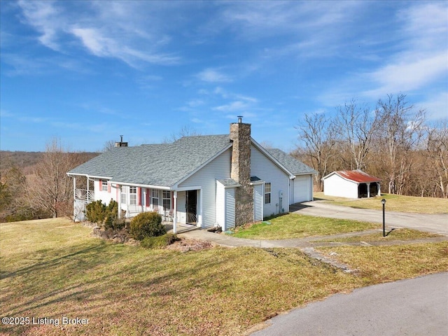 single story home with a garage, a shingled roof, a chimney, a porch, and a front yard