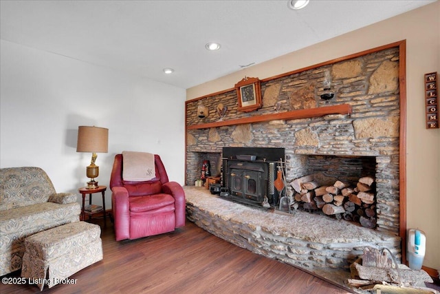 living room featuring recessed lighting and wood finished floors