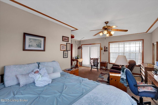 carpeted bedroom with a ceiling fan