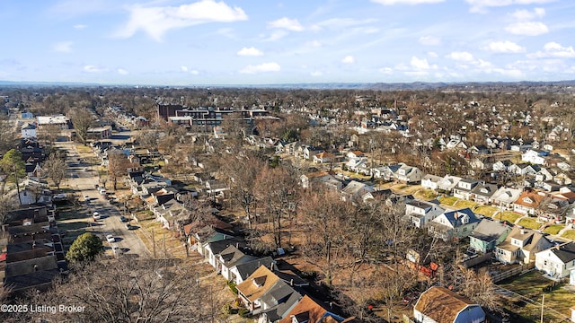 birds eye view of property with a residential view