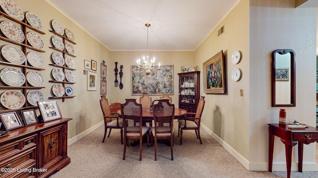 dining room with a chandelier, ornamental molding, visible vents, and light colored carpet