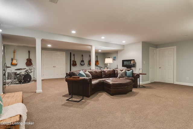 living room featuring carpet, baseboards, and recessed lighting