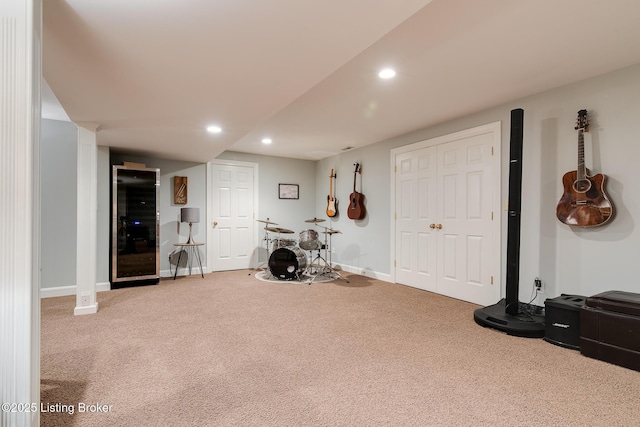 workout area featuring baseboards, carpet flooring, and recessed lighting