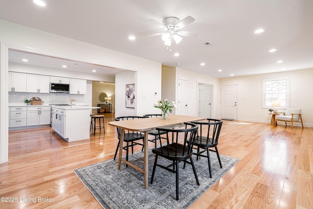 dining area with recessed lighting, baseboards, ceiling fan, and light wood finished floors