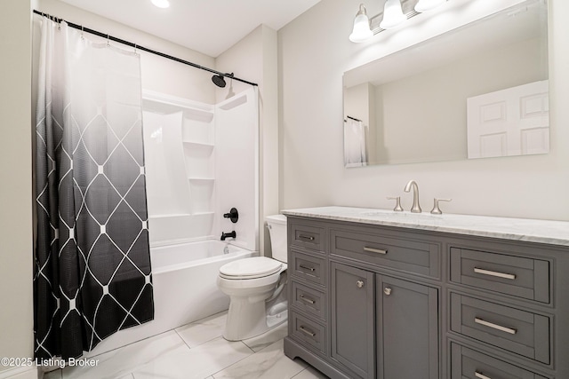 bathroom featuring toilet, marble finish floor, shower / tub combo with curtain, and vanity