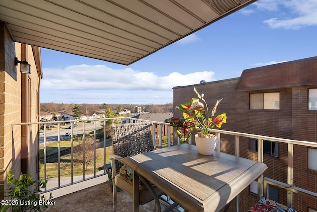 balcony featuring outdoor dining area