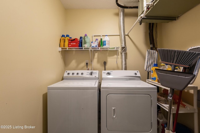 laundry area with laundry area and washing machine and dryer