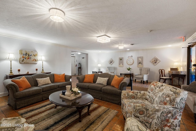 living room featuring ornamental molding, tile patterned flooring, and a textured ceiling