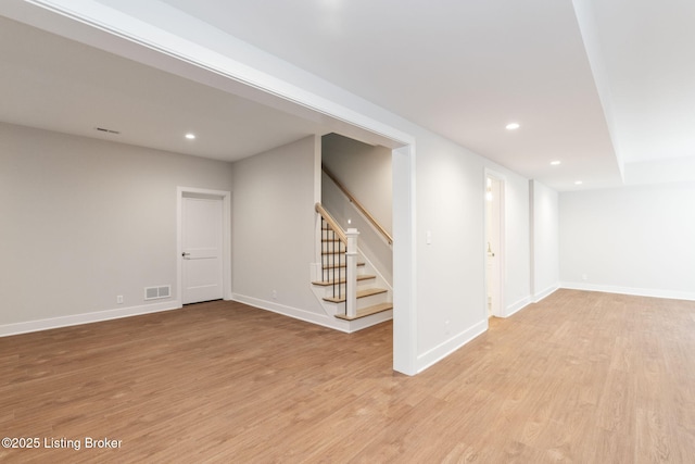 3314 Catalpa Farms Dr, Fisherville, KY 40023 - finished below grade area with light wood-style floors, stairway, baseboards, and recessed lighting