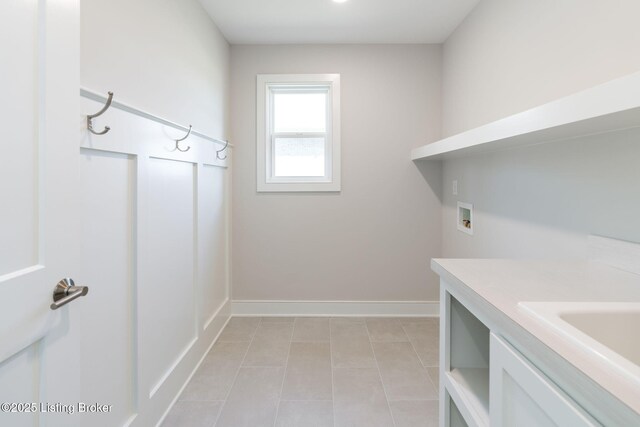 3314 Catalpa Farms Dr, Fisherville, KY 40023 - laundry area featuring hookup for a washing machine, light tile patterned floors, and baseboards