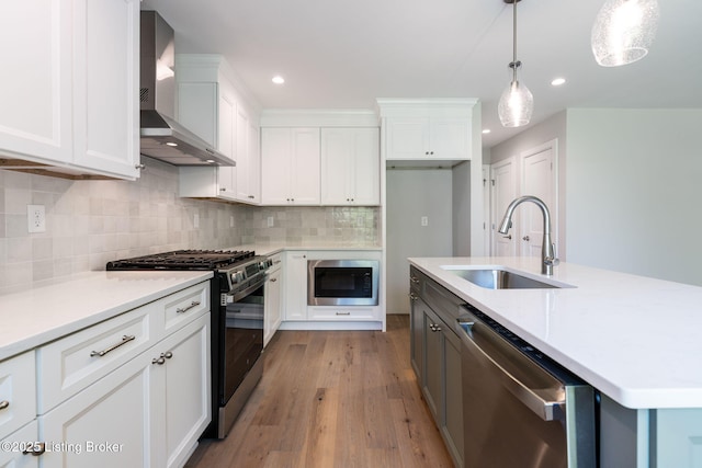 3314 Catalpa Farms Dr, Fisherville, KY 40023 - kitchen featuring wall chimney exhaust hood, stainless steel appliances, a sink, light countertops, and white cabinetry