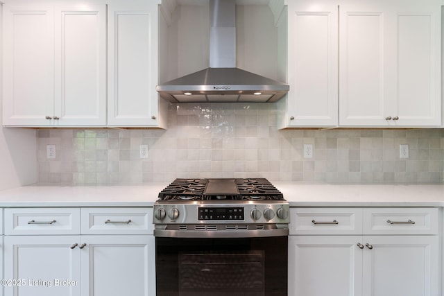 3314 Catalpa Farms Dr, Fisherville, KY 40023 - kitchen featuring wall chimney range hood, stainless steel range with gas stovetop, light countertops, and white cabinets