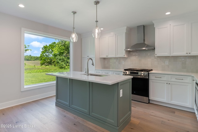 3314 Catalpa Farms Dr, Fisherville, KY 40023 - kitchen with wall chimney exhaust hood, stainless steel range with gas cooktop, a sink, tasteful backsplash, and light countertops