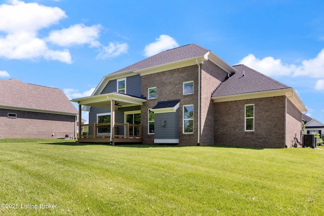 3314 Catalpa Farms Dr, Fisherville, KY 40023 - back of house with cooling unit, ceiling fan, brick siding, and a lawn
