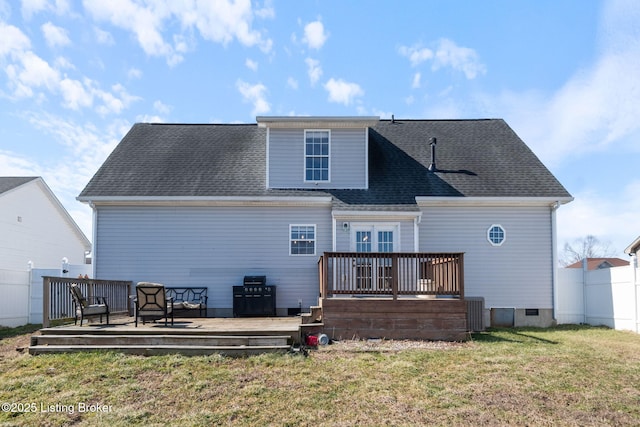 back of house with a deck, a shingled roof, fence, a yard, and crawl space