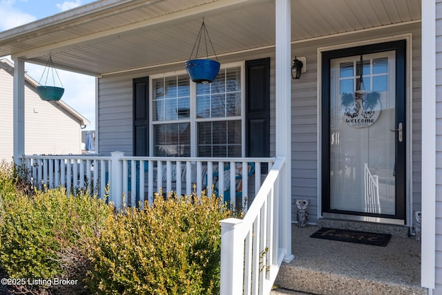 entrance to property with a porch