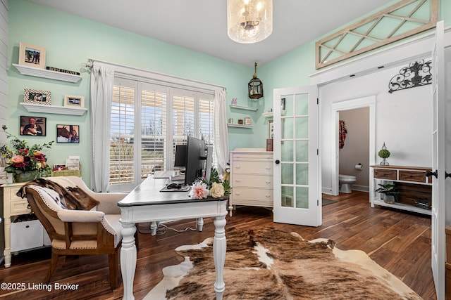 office area featuring vaulted ceiling, french doors, and wood finished floors