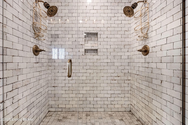 bathroom with a shower stall