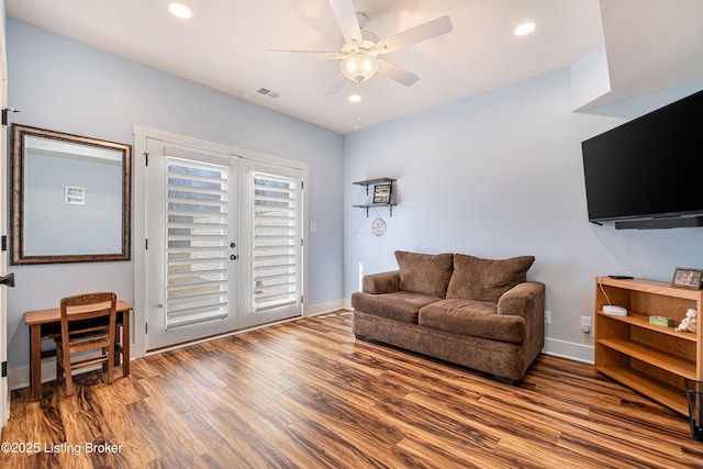 living room with visible vents, french doors, wood finished floors, and recessed lighting