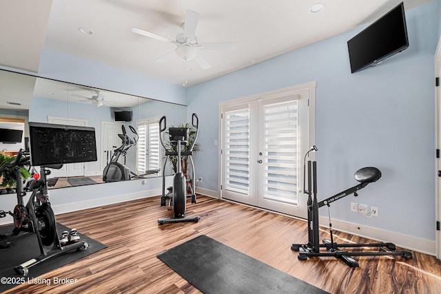 exercise room with ceiling fan, recessed lighting, wood finished floors, and baseboards