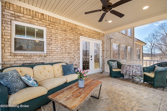 exterior space with french doors, ceiling fan, and an outdoor living space