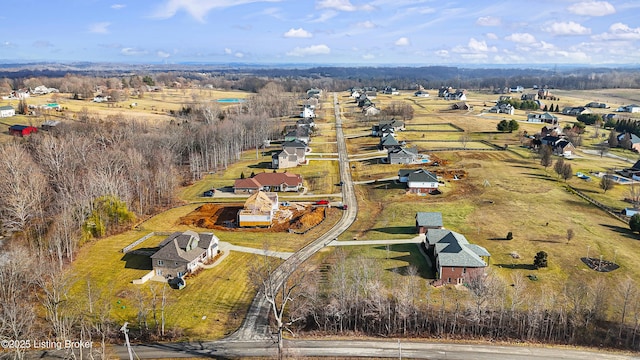 birds eye view of property featuring a rural view