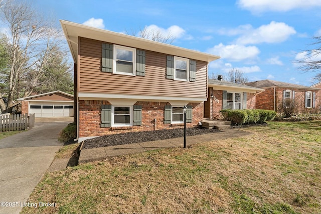 split level home with brick siding, fence, a garage, an outdoor structure, and a front lawn