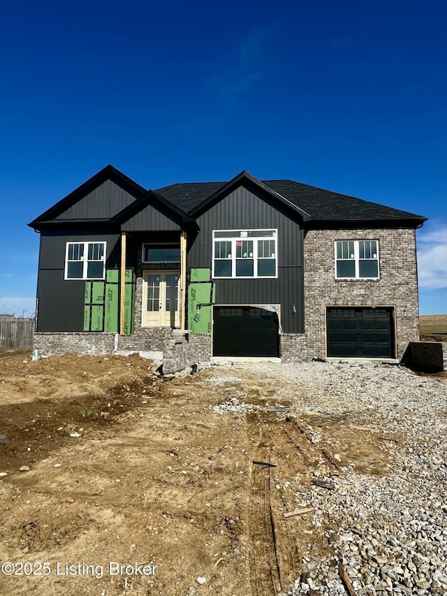 view of front facade with a garage and driveway