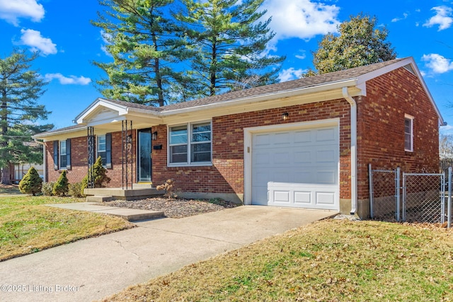 single story home featuring an attached garage, fence, a front lawn, and brick siding