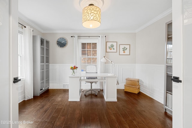 unfurnished office with dark wood-style floors, wainscoting, ornamental molding, and a decorative wall