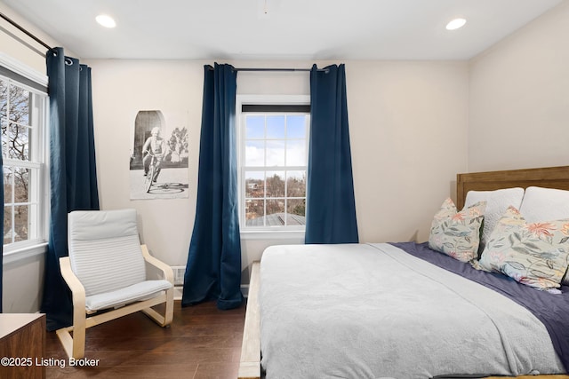 bedroom featuring wood finished floors and recessed lighting