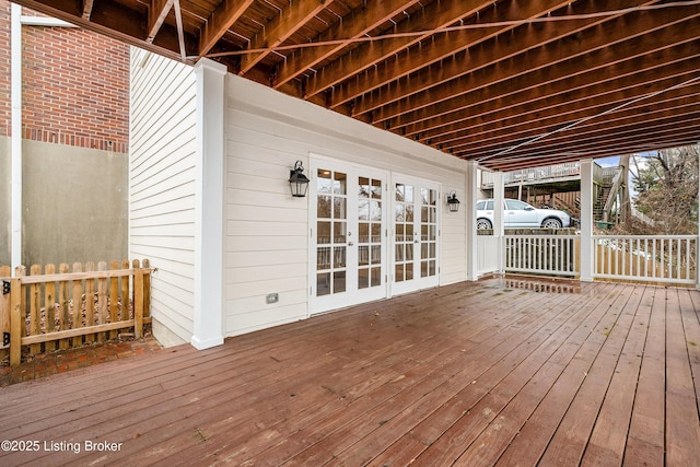 wooden deck featuring french doors