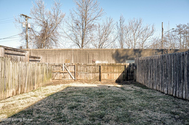 view of yard featuring a fenced backyard